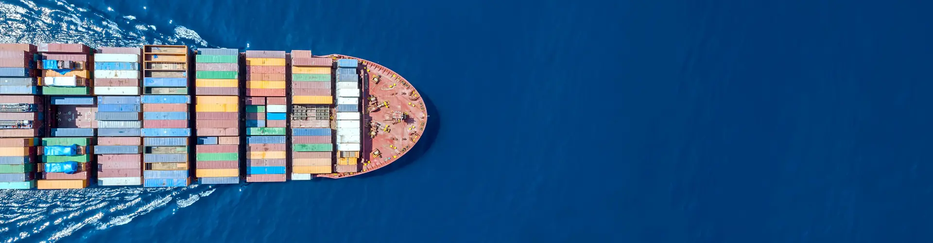 Aerial view of a container ship carrying export goods